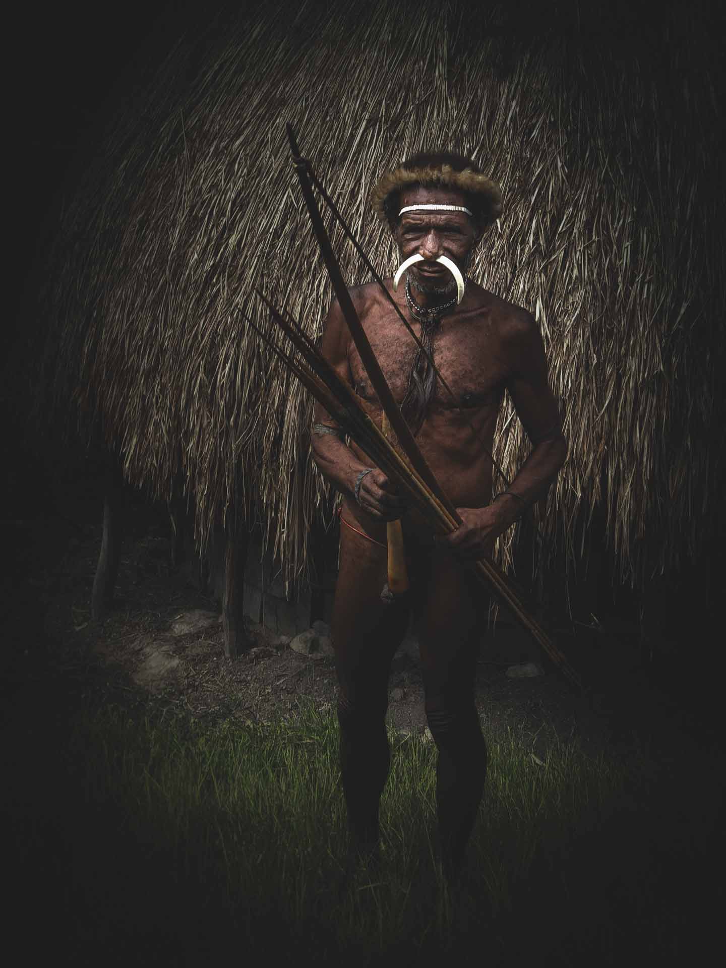 Man with traditional dress in Baliem Valley